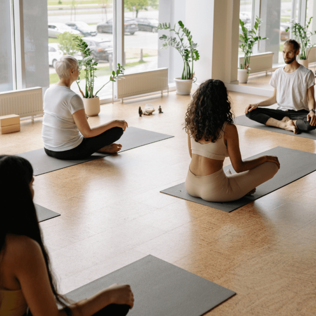 A yoga class in a bright studio
