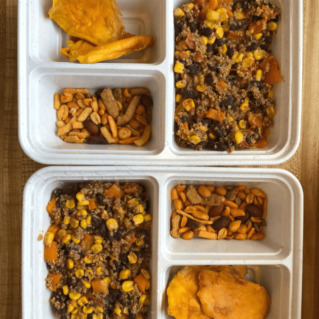 quinoa and bean salad, dried mango and trail mix for a prepped healthy lunch