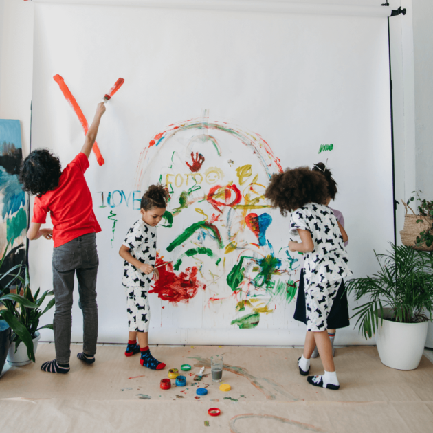 children painting together