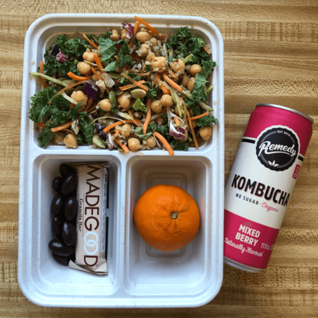 A high protein salad and Kombucha with snacks for a on the go lunch