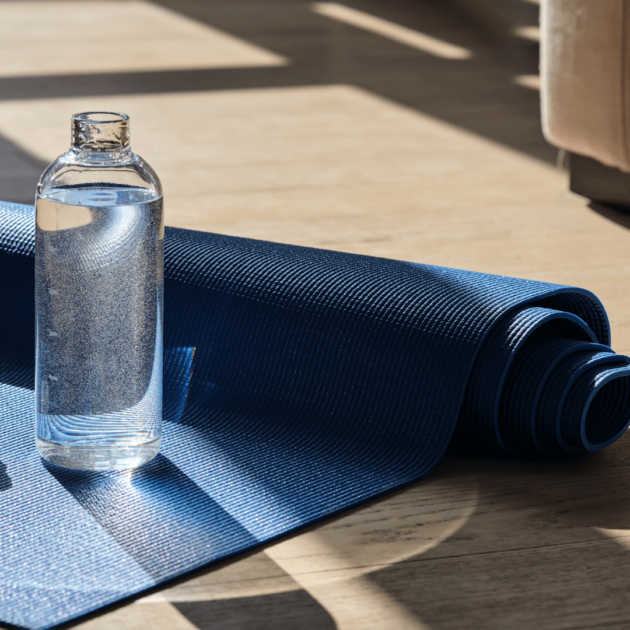 a reusable waterbottle and yoga mat