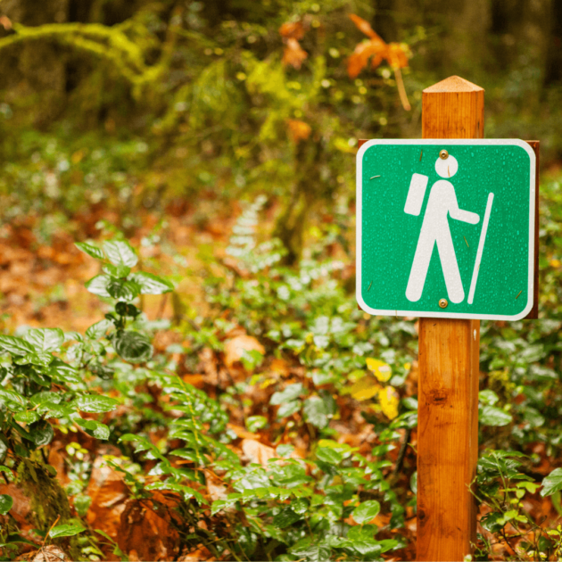 a hiking trail sign which is helpful to inexperienced hikers