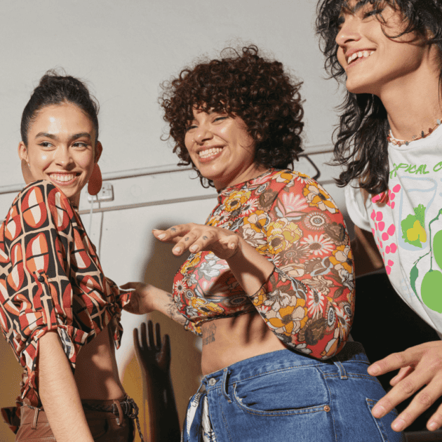 a community of women dancing together and celebrating self love and community