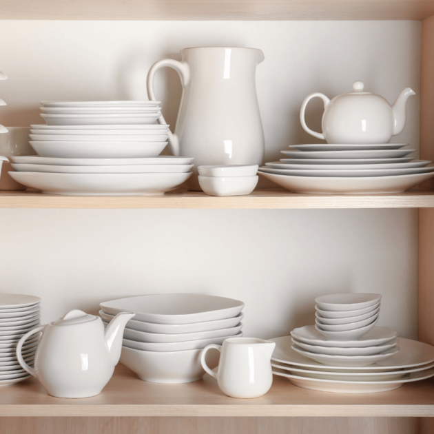 organized cabinets of plates, cups and bowls