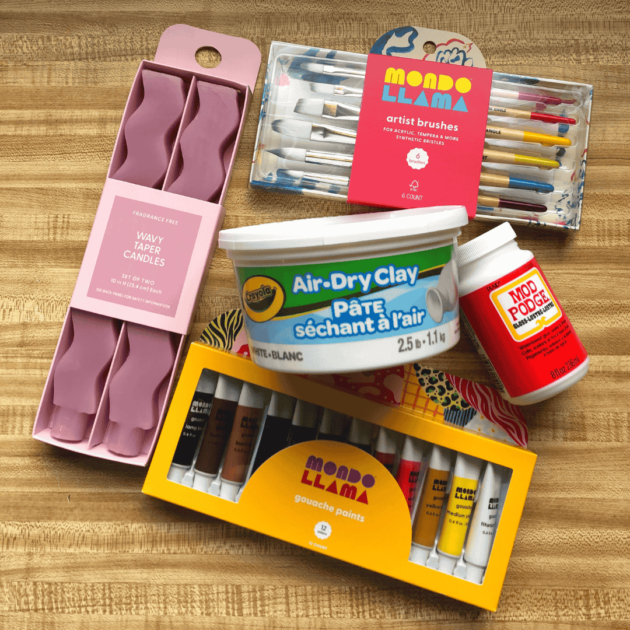paint, candles, paint brushes, modge podge, and air dry clay