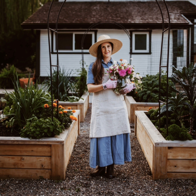 a woman in her rustic garden